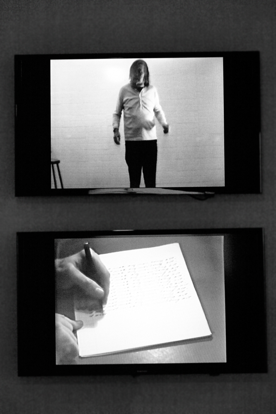 John Baldessari, Exhibition view of the videos I Am Making Art (1971) and I Will Not Make Any More Boring Art (1971) at the III Venice International Performance Art Week 2016. Image © Claudia Popovici